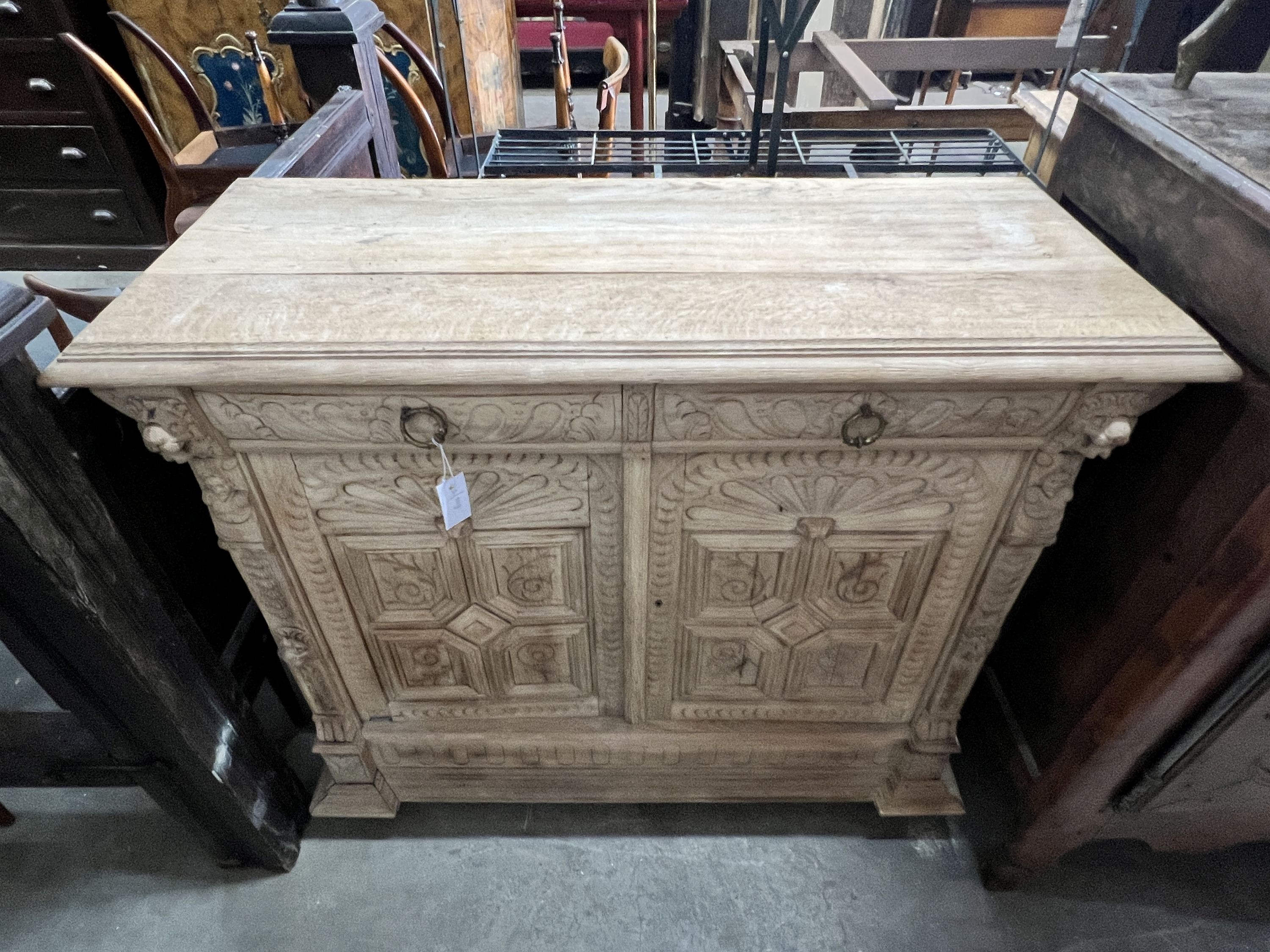 A late 19th century Flemish bleached oak buffet, length 120cm, depth 47cm, height 100cm